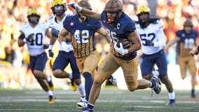 No. 22 Illinois beats No. 24 Michigan 21-7 for its first win over the Wolverines since 2009