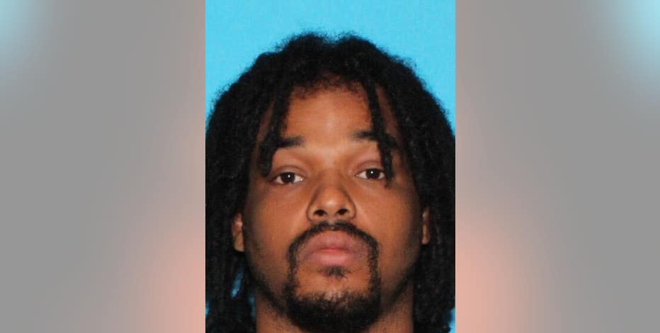 Armed suspect possibly barricaded inside Dearborn apartment after assaulting woman