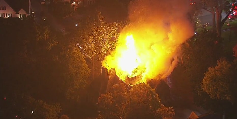 Detroit firefighters battle large house fire in Palmer Woods