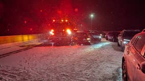 3 drivers hit firetruck while crews respond to pileup on icy Michigan freeway