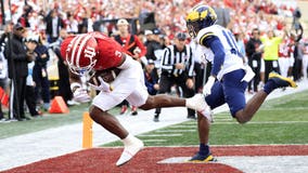 No. 8 Indiana scores 2 early TDs to beat Michigan 20-15 and earn school-record 10th win