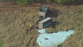 Salt dumped along I-94 after semi-truck driver loses control during suspected medical emergency