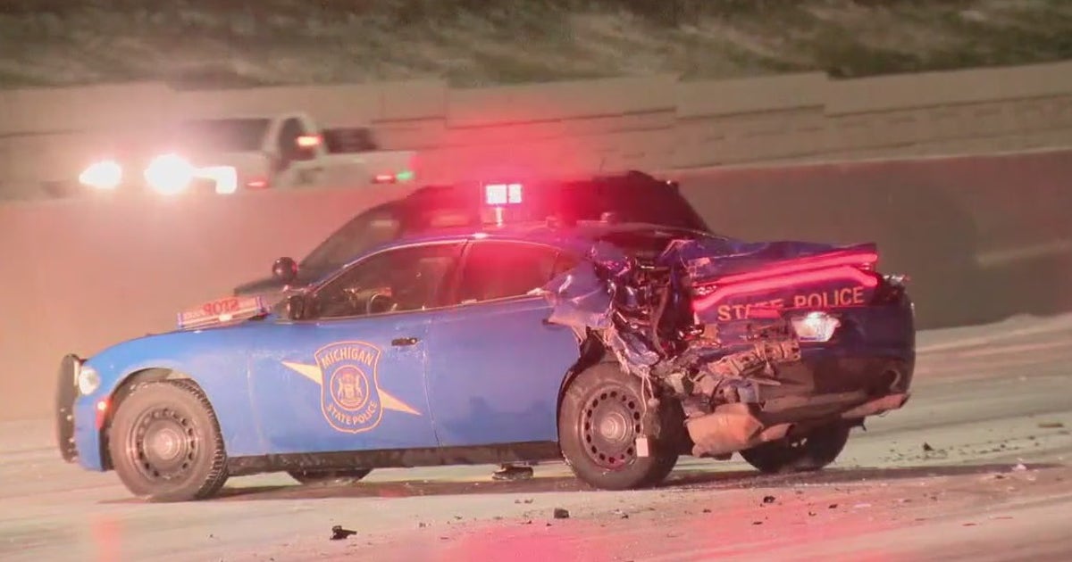 Semi-truck driver arrested after crashing into Michigan State Police ...