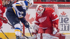 Holloway gets 1st career hat trick as the Blues blank the Red Wings 4-0