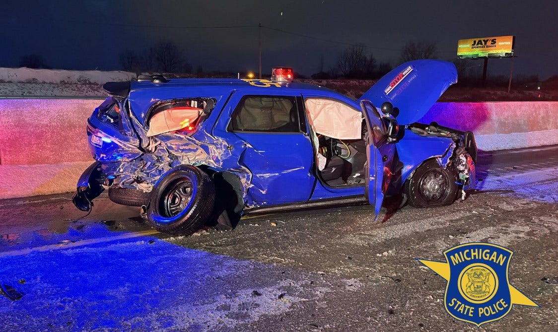 Suspected drunk driver crashes into state police car on I-75 ...
