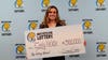 Indiana woman wins $500K on Michigan Lotto scratch-off after trading white elephant gift with dad