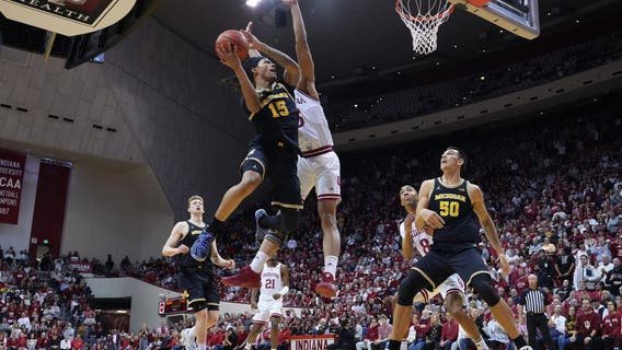 Danny Wolf helps No. 24 Michigan fend off hard-charging Indiana 70-67 for 4th straight win