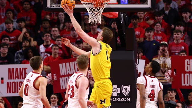Wolf records double-double to lead Michigan to 66-63 win over Rutgers