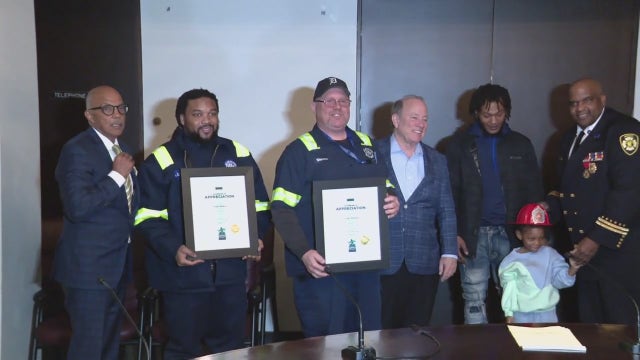 Heroic DWSD workers honored by Detroit leaders for saving family from house fire