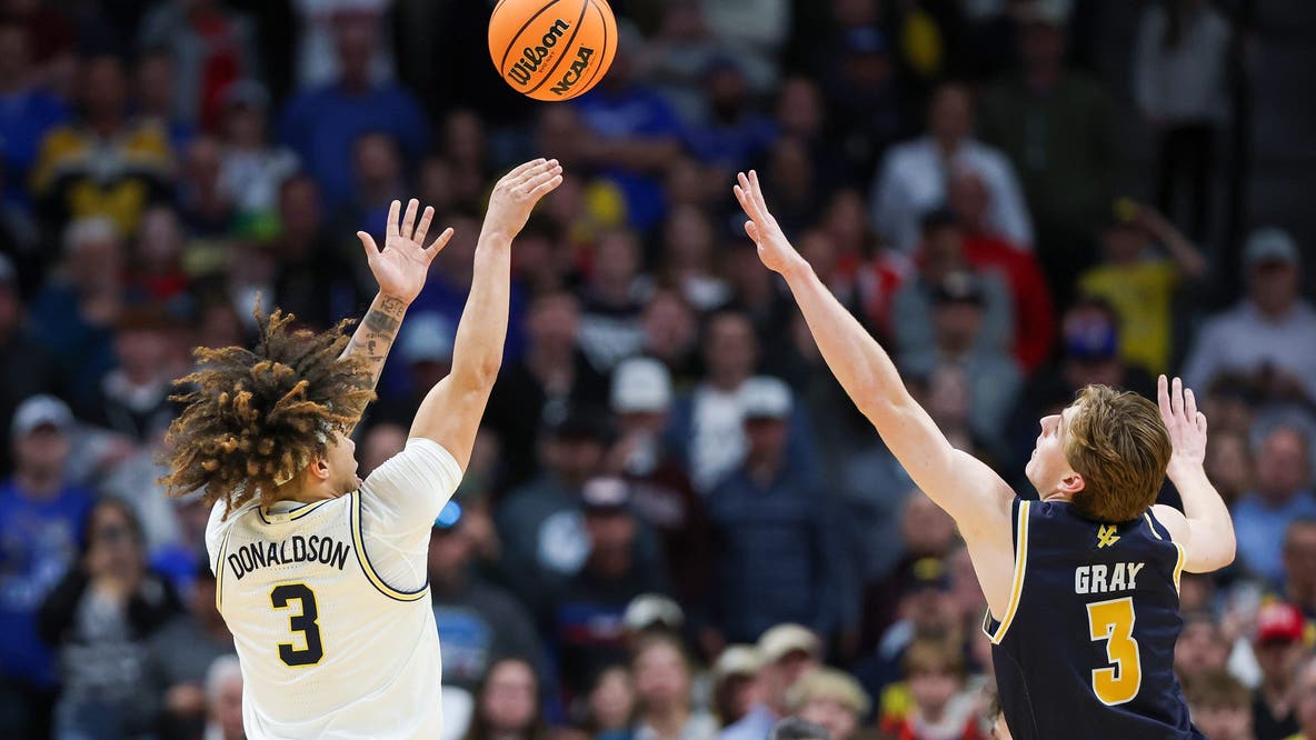 No. 5 seed Michigan holds off UC San Diego 68-65 in March Madness nailbiter