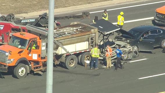 Car crashes into Wayne County road crew trailer on I-96