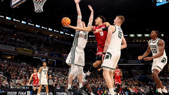 Tonje scores 32 as No. 18 Wisconsin tops No. 7 Michigan St. 77-74 in Big Ten semis