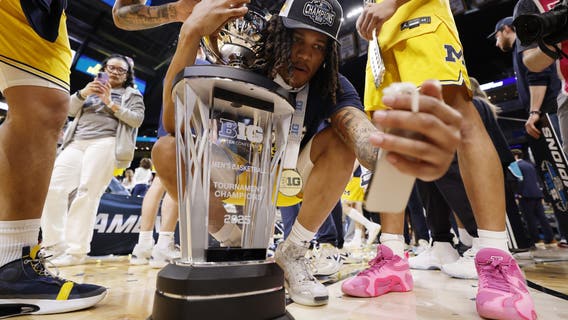 Donaldson helps No. 22 Michigan rally late again to beat No. 18 Wisconsin 59-53 for Big Ten title