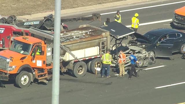Car crashes into Wayne County road crew trailer on I-96