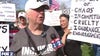 Protesters amass against Trump outside Macomb Community College for visit