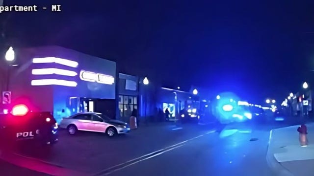 Person shot in front of Orchid Theatre in Ferndale