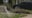 Driver fleeing Warren police crashes into parked vehicles, house