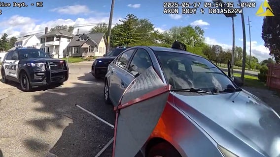 Intoxicated driver found with construction sign stuck to car after hitting mailboxes in Monroe