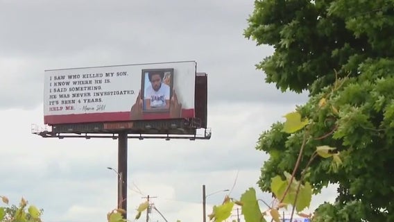 Highland Park mother displays message on billboard seeking resolution in son's death