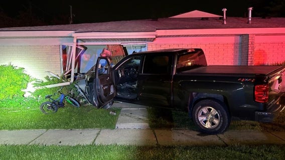 Pontiac kids nearly hit when suspected drunk driver crashes into living room