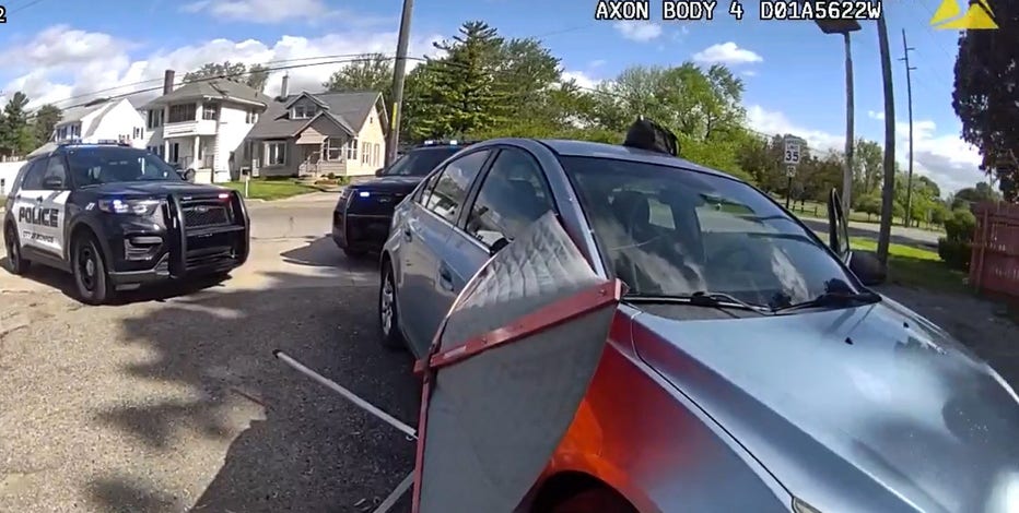 Intoxicated driver found with construction sign stuck to car after hitting mailboxes in Monroe