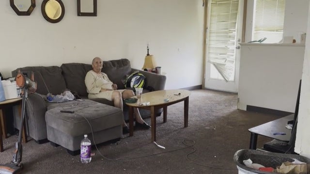Detroit senior dealing with black mold, flood damage, exposed walls in rental unit