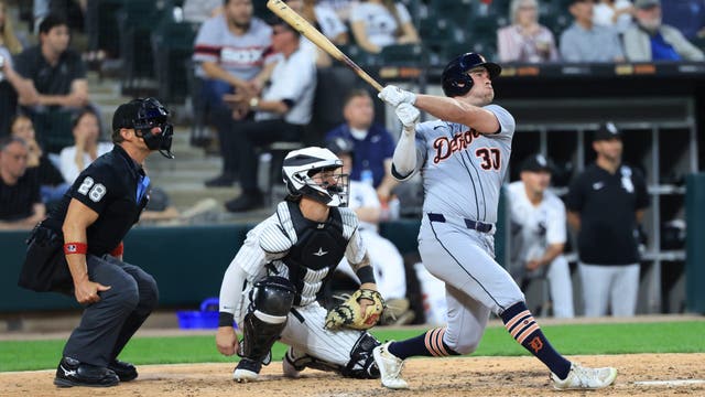 Carpenter hits 3 homers as the Tigers reach 40 wins by pounding the White Sox 13-1
