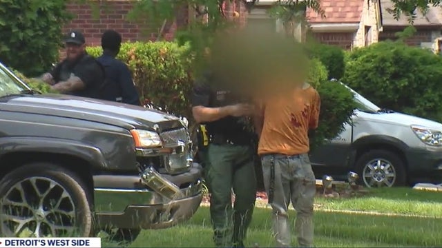 Detroit police arrest four armed men after officer sees suspect pistol whip man on city's west side