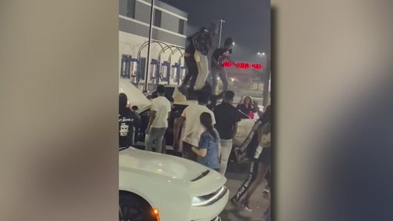 Detroit street takeover of 200 people leaves car on fire, multiple arrests