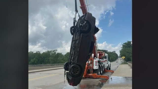 Van Buren Twp. police searching for clues after 1997 Ford Mustang was pulled from lake