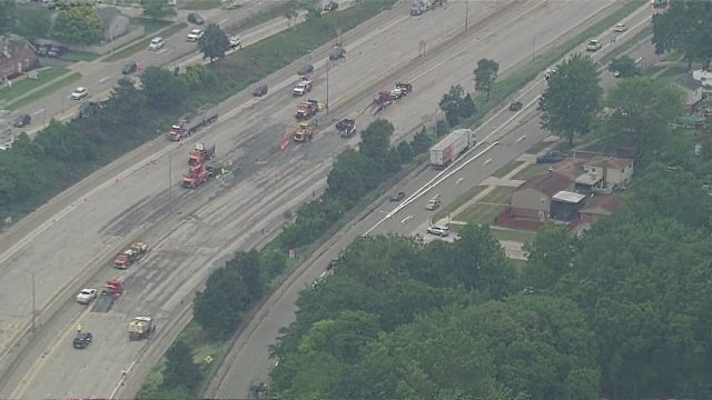 I-696 cleanup continues at 11 Mile after semi-truck crash through median wall