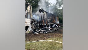 Woman dies in mobile home fire, three teenagers escape
