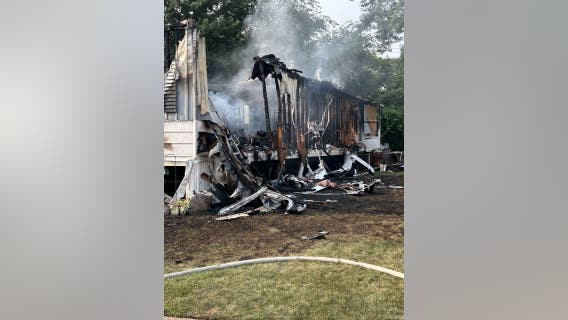 Woman dies in mobile home fire, three teenagers escape
