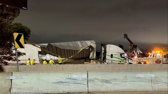 40,000 pounds of merchandise spilled on Detroit freeway after semi driver flips trailer on ramp