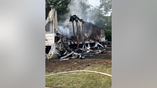 Woman dies in mobile home fire, three teenagers escape