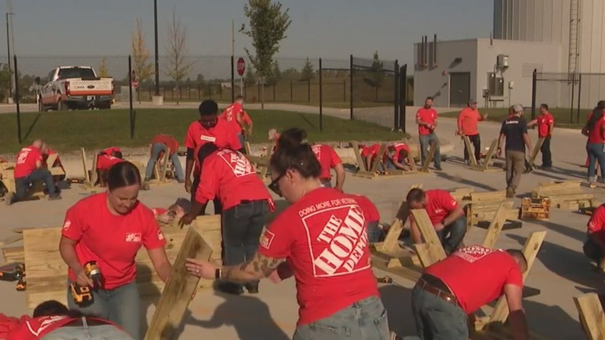 Volunteers join Home Depot to perform day of service to remember 9/11