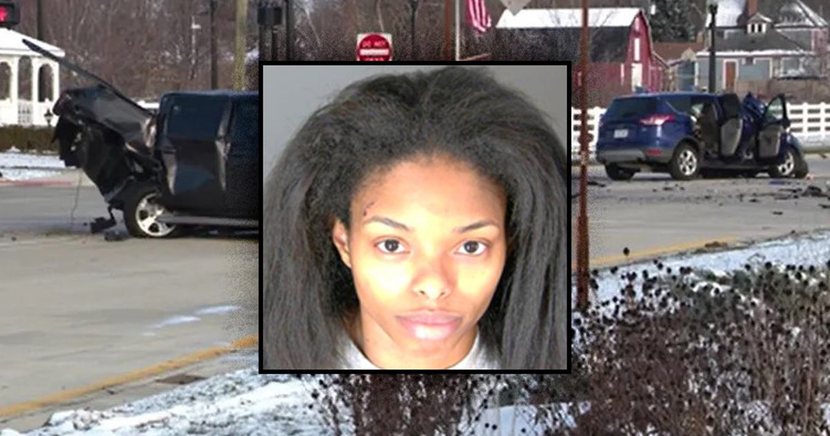 A woman accused of causing a fatal crash and biting a Warren police ...