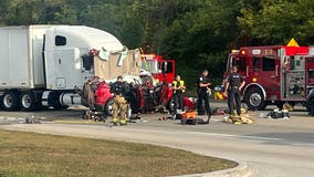Semi truck crash in Van Buren Township leaves SUV destroyed, driver hospitalized