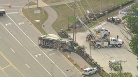 Lake Orion serious injury crash leaves garbage truck on its side, road shut down