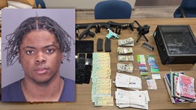 Counterfeit cash, guns, victims' personal documents seized from West Bloomfield home