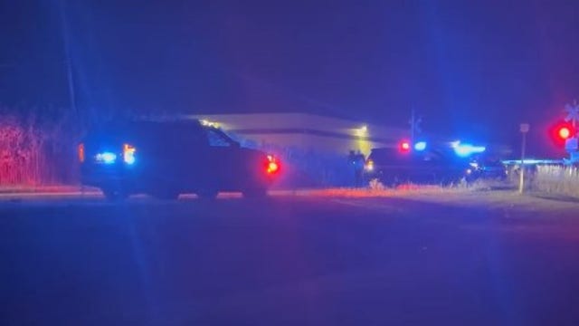 Truck overturns after striking control box near train tracks in Brownstown Township