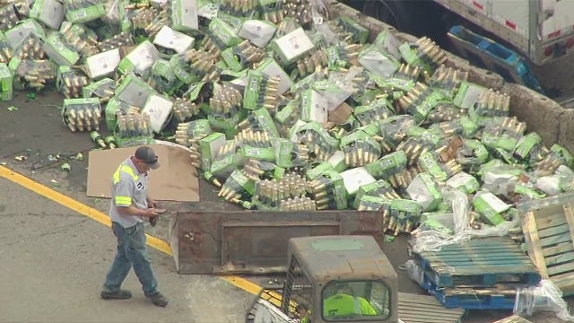 Crash on I-94 closes freeway, spilling bottles in Ann Arbor
