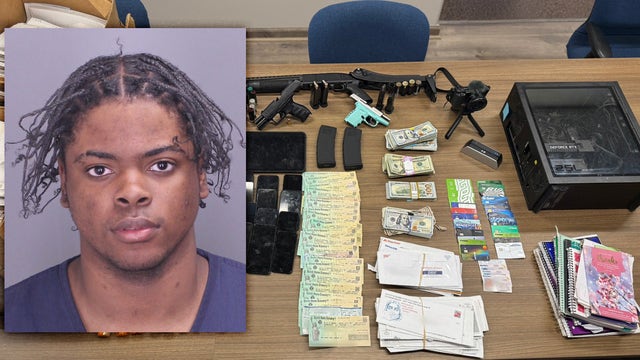 Counterfeit cash, guns, victims' personal documents seized from West Bloomfield home