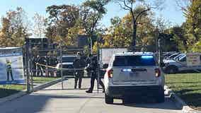 Woman shot inside vehicle after she attempted to ram officers, police say