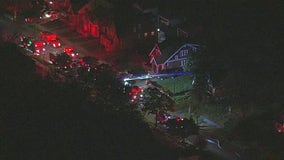 Detroit firefighter injured after falling through floor while battling fire