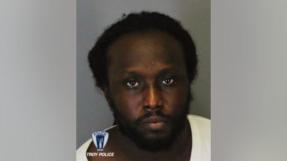 Flint man accused of robbing Troy bank