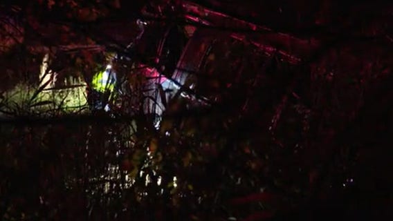 Driver of limo bus that flipped along I-75 wasn't properly licensed, MSP says