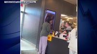 McDonald's coffee attack caught on camera by couple in the lobby