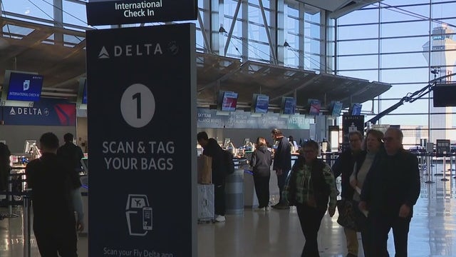 DTW affected by nationwide flight reduction order, travelers brave the chaos