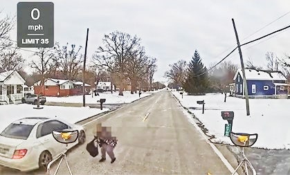 Video: Romulus student nearly hit by car during school bus stop